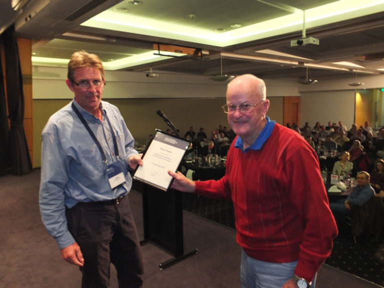 Simon Cruickshank presents Fellow of AHA certificate to Max Hayes